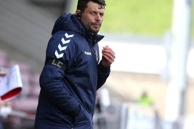 Cobblers assistant boss Marc Richards, a close friend of Lee Collins, wore an armband with the initials LC on it