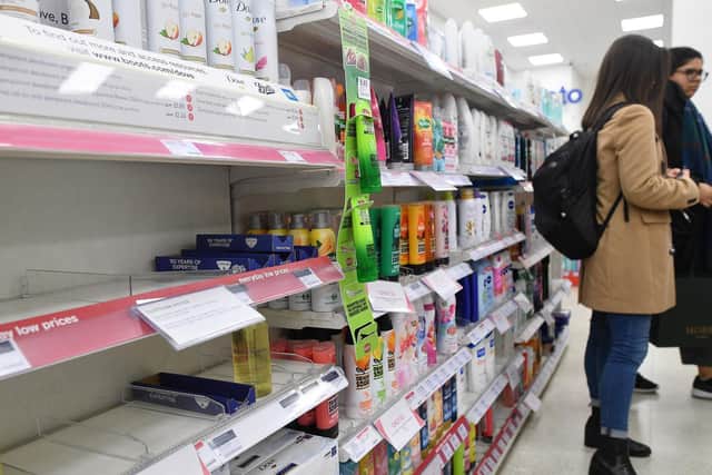 A picture from March 3 showing a Boots pharmacy completely sold out of hand sanitiser. Photo by JUSTIN TALLIS / AFP) (Photo by JUSTIN TALLIS/AFP via Getty Images)