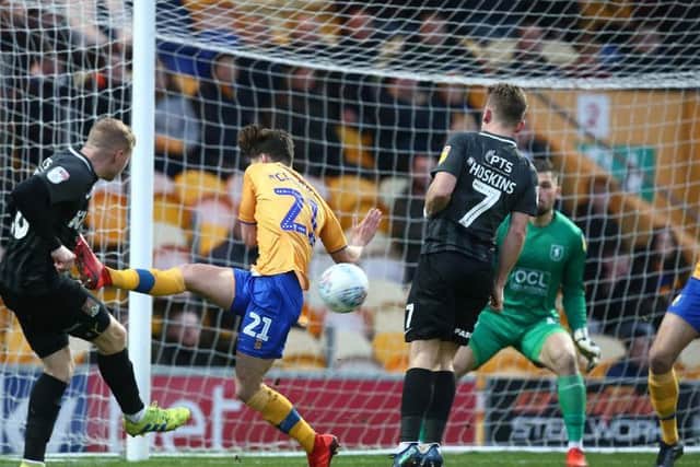 Nicky Adams has a shot blocked during Cobblers' 1-1 draw at Mansfield in December.