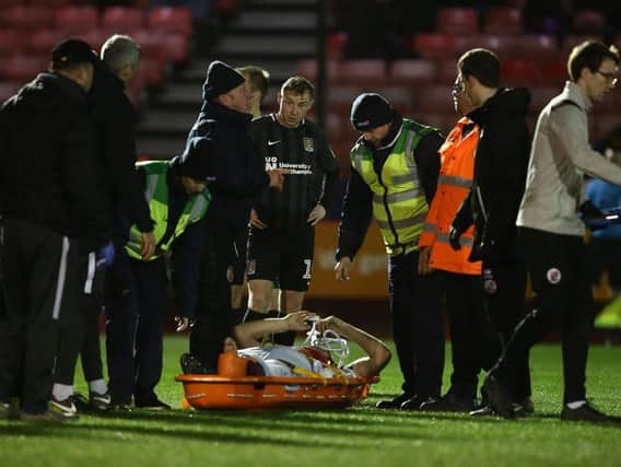 Harry Smith was given oxygen and had to be stretchered from the field at Crawley, prompting fears he'd miss the rest of the season.