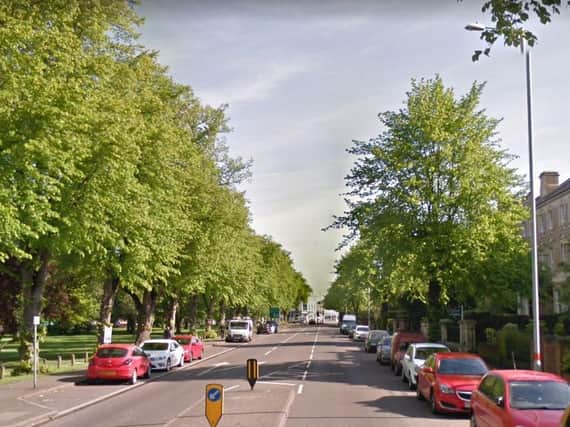 Police are hunting for a woman who has been posting food and poo through letterboxes along this street.