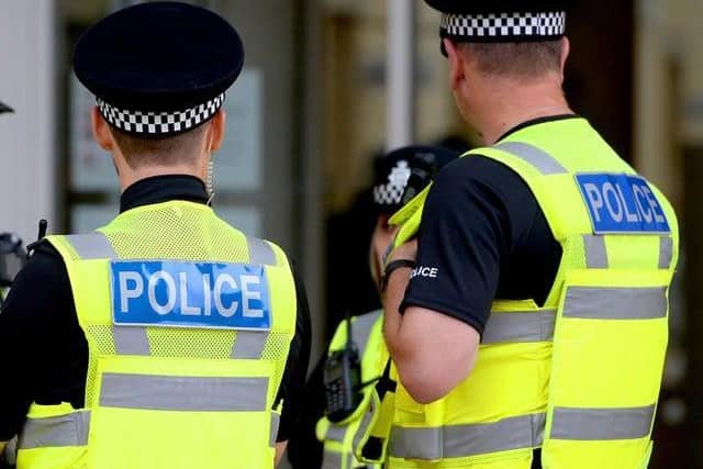 Police are hunting a mystery motorist who gave them a lift