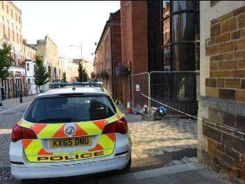 Taiwo sprinted down this back-alleyway next to the Old Bank so he could punch Glenn in the back of the head. The attack proved fatal.