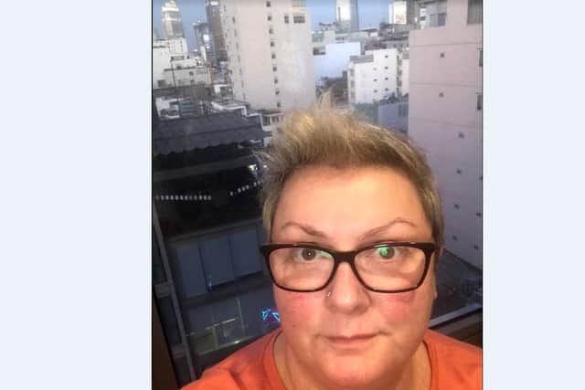 Wendy on her balcony in Saigon.