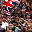 Lewis Hamilton goes crowd surfing after winning the 2019 British Grand Prix at Silverstone