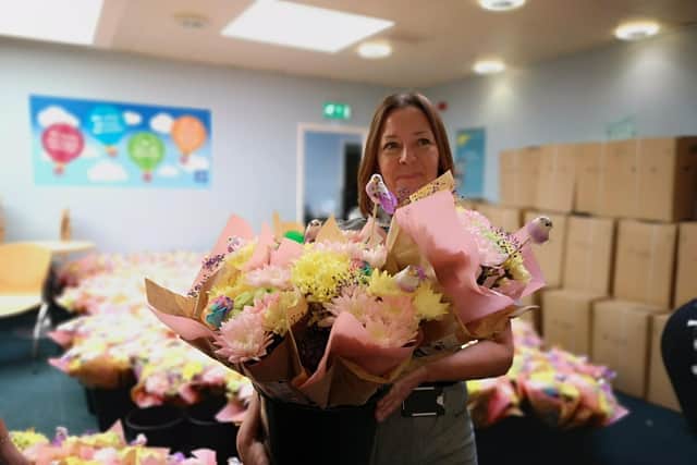 Staff leaving their shifts on Sunday were given free flowers courtesy of Lidl supermarket.