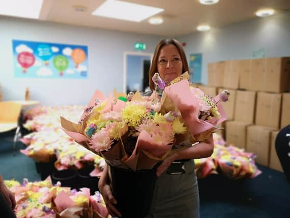 Staff leaving their shifts on Sunday were given free flowers courtesy of Lidl supermarket.