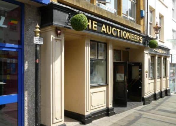 Police are investigation an assault outside The Auctioneers in Northampton Market Square
