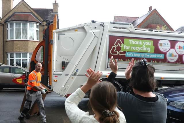 Northampton residents applaud the refuse collectors during the coronavirus crisis