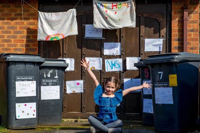 Scarlett is echoing the Government's message and it telling everyone to 'stay at home, save the NHS and save lives'. Pictures by Leila Coker.