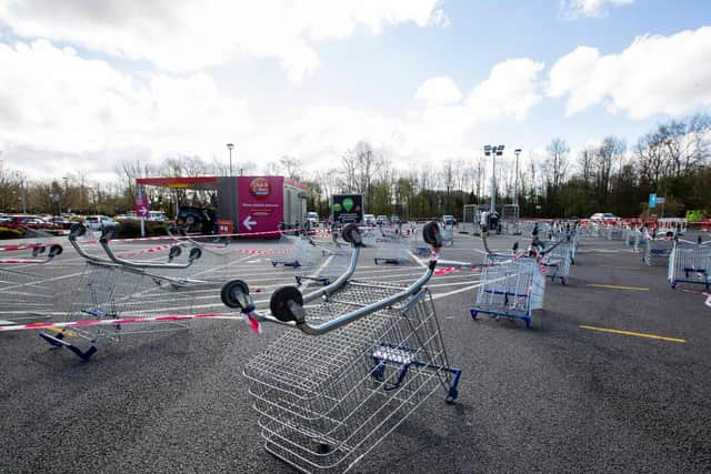 Trolleys have been used to mark out the click and collect queue at Tesco in Northampton. Photo: Leila Coker