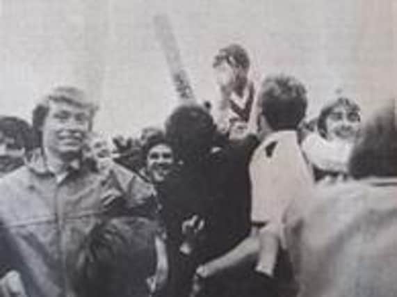 Jim Griffiths is carried off after his heroics