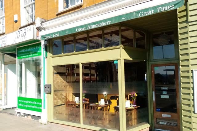 Immigration officers executed a warrant at the Les Olives restaurant in December, but the restaurant is disputing claims it employed illegal workers in its kitchen