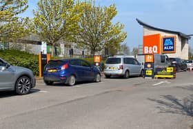 Cars queuing for B&Q in Towcester Road, Northampton, on Saturday lunchtime (April 11). Photo: Leila Coker