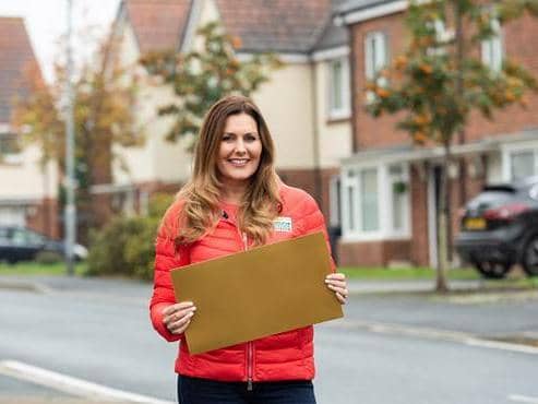 Postcode Lottery ambassador Judie McCourt has some good news for three lucky winners in Northamptonshire