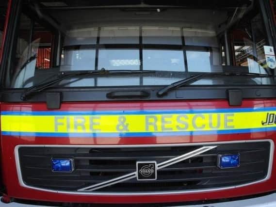 A bonfire in Harlestone Road had to be put out by a fire crew after it grew "out of control".