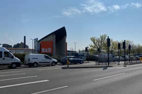Cars queuing to collect orders from B&Q in Northampton on Saturday (April 11). Photo: Leila Coker