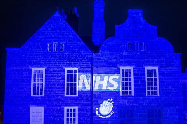Delapre Abbey made a spectacular sight lit up in NHS blue