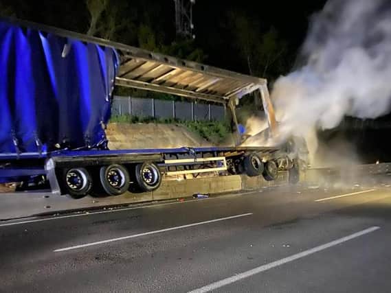 One lorry caught fire after mounting the central reservation barrier