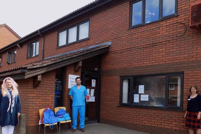 A socially-distanced drop off of scrubs from Scrub Up for Northants NHS to Towcester Medical Centre
