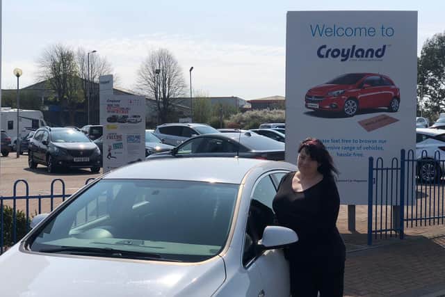 Albie with the car from Croyland Car Megastore in Rushden