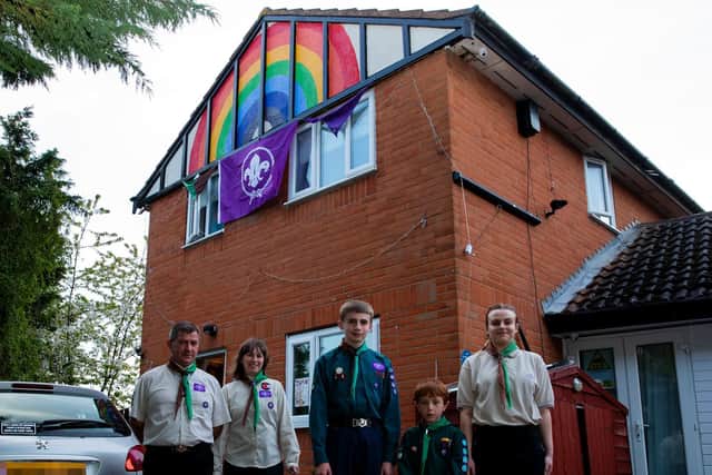 The Hodgkiss family have painted a rainbow on their roof to raise a smile among their neighbourhood.