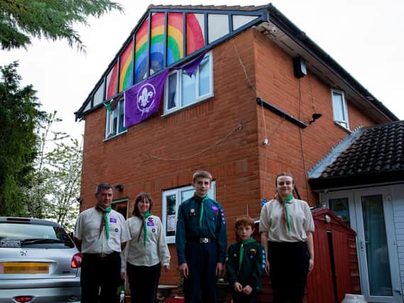 The Hodgkiss family have painted a rainbow on their roof to raise a smile among their neighbourhood.