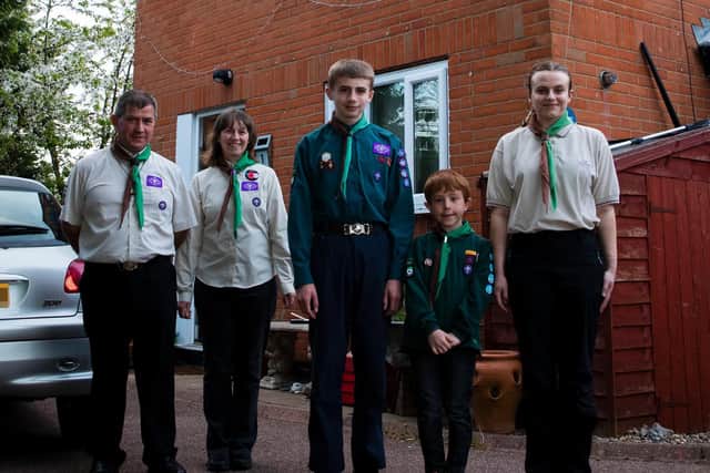 James, Tracey, Jacob, Harry and Chloe all put their scouting uniforms on last night to renew their scouts promise to St George.Picture by Leila Coker.