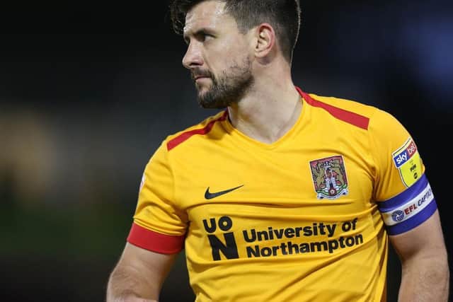David Buchanan was captain under Curle.
