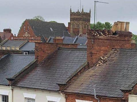 The chimney tumbled from a great height in the windy and stormy weather.