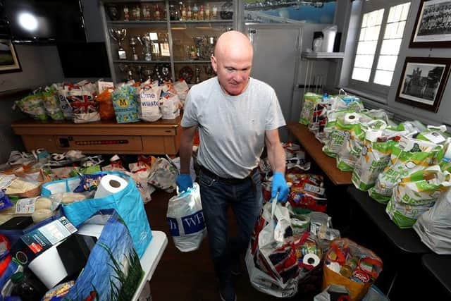 Teresa's husband, Anthony Dixon, has also been hand on with the food bank.