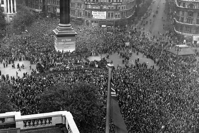 There are many famous pictures of the huge crowds celebrating in London - but Maurice was there to see it in person. Fred Morley/Fox Photos/Hulton Archive/Getty Images