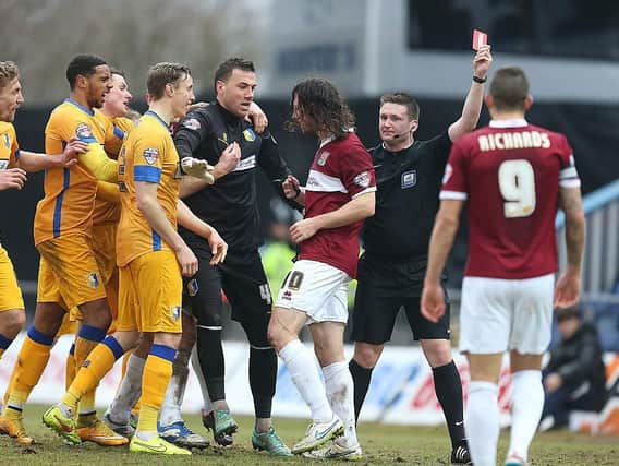 John-Joe O'Toole is sent off during a game against Mansfield in 2015... on an afternoon christened 'John-Joe O'Toole day' by supporters.