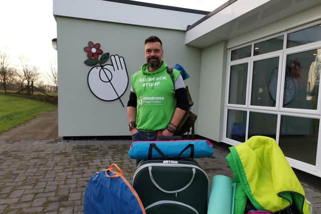 Christian Coley at Emmaus Village Carlton, with supplies for the weekly Rucksack Stomp.