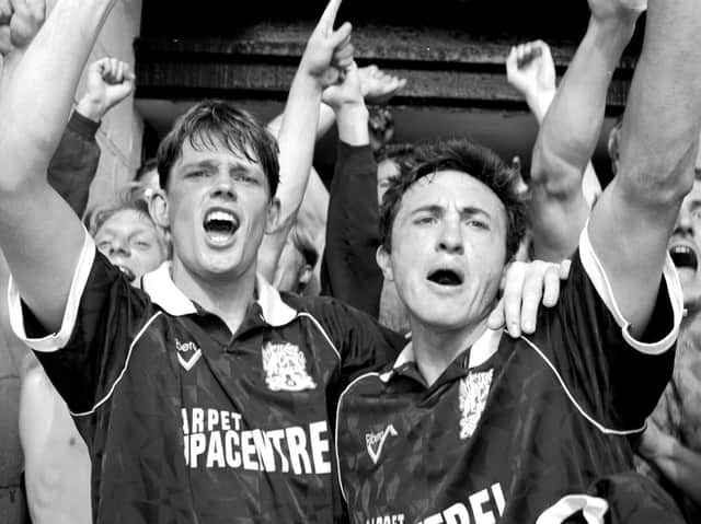 Pat Gavin and player-boss Phil Chard celebrate after the Cobblers' final day win at Shrewsbury in 1993 (Picture: Pete Norton)