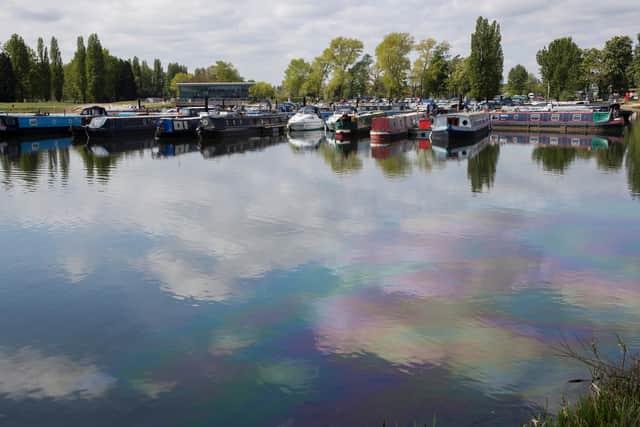 Environment workers have been cleaning the water for 11 days. Pictures taken at Billing Marina by Leila Coker on 27 April.