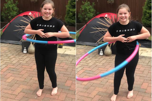 Sienna Ginder has raised more than 200 for charity by hula hooping.