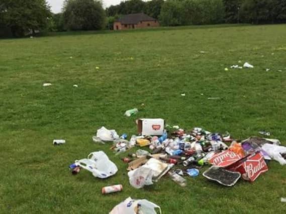 Rubbish was left strewn across the field after the large group left.