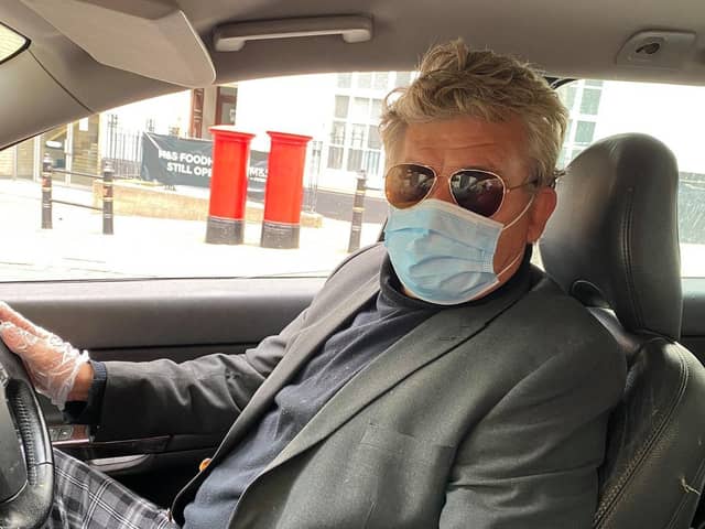 Peters Shoes founder Peter Bullock wearing one of his firm's face masks