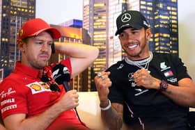 Lewis Hamilton with Sebastian Vettel