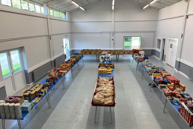 The food parcels in production in Hartwell Community Centre.