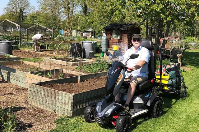 Mark Boss on his TGA Vita X next to his beloved allotment plot in Hartwell
