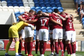 Cobblers huddle.