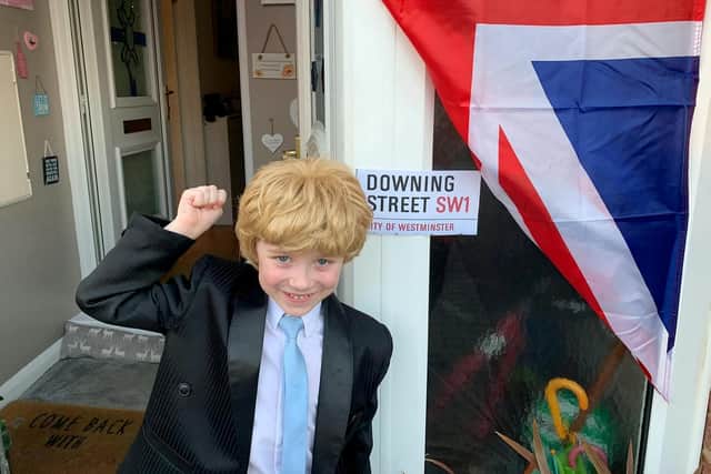 Alfie started his dressing up craze as a doctor before recreating a miniature Boris Johnson (pictured).