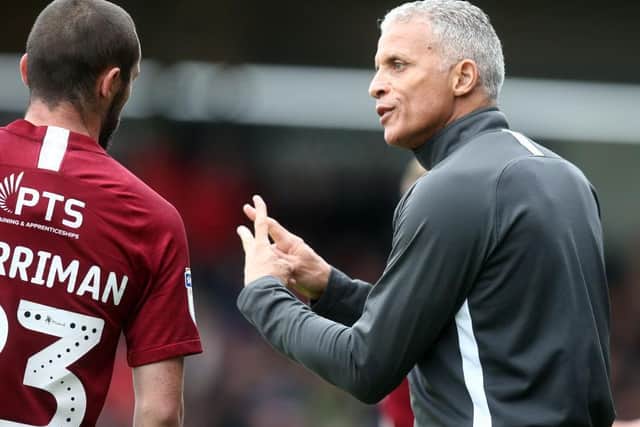 Keith Curle and Michael Harriman.