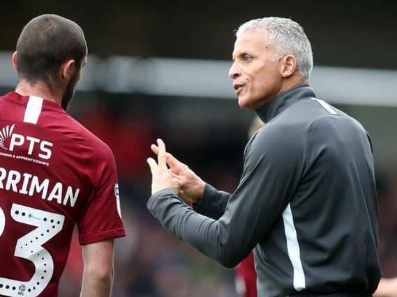 Keith Curle and Michael Harriman.