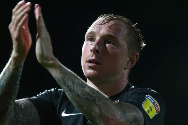 Nicky Adams wants to repay supporters by winning promotion.
