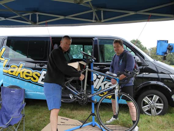 Iain Noy offers some technical support to a rider at last year's Cycle4Cynthia