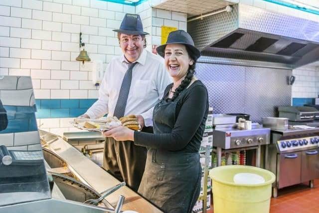 Nick pictured with Holly back in 2019 after receiving the good news that they were voted the most popular chippy by readers.