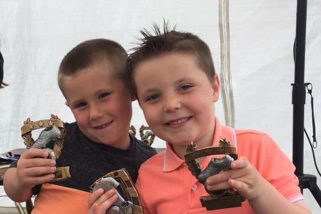 Best friends Drew Pond and Alfie Tolputt, both seven, came up with the idea to travel seven miles in seven days for charity